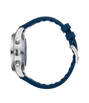 Stainless steel chronograph watch with dark blue dial and blue rubber strap, shown from the side.