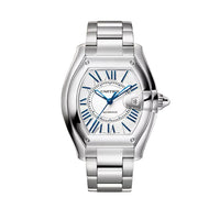 Silver Cartier watch with blue accents on a light beige background
