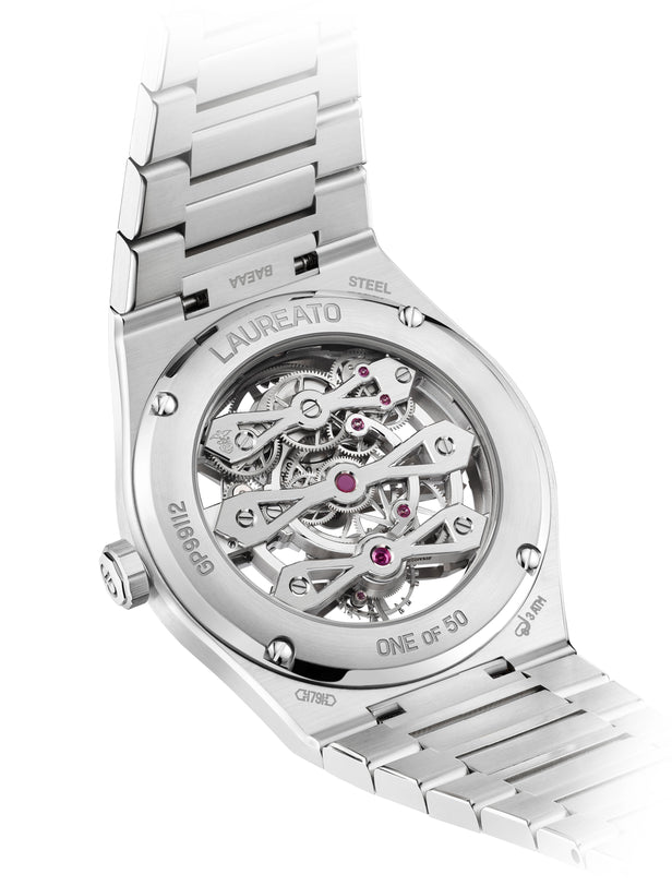 A close-up of the Laureato Three Gold Bridges by Girard-Perregaux showcases its intricate tourbillon movement through a transparent case back, with "Laureato," limited edition details, and serial numbers engraved on the metal.