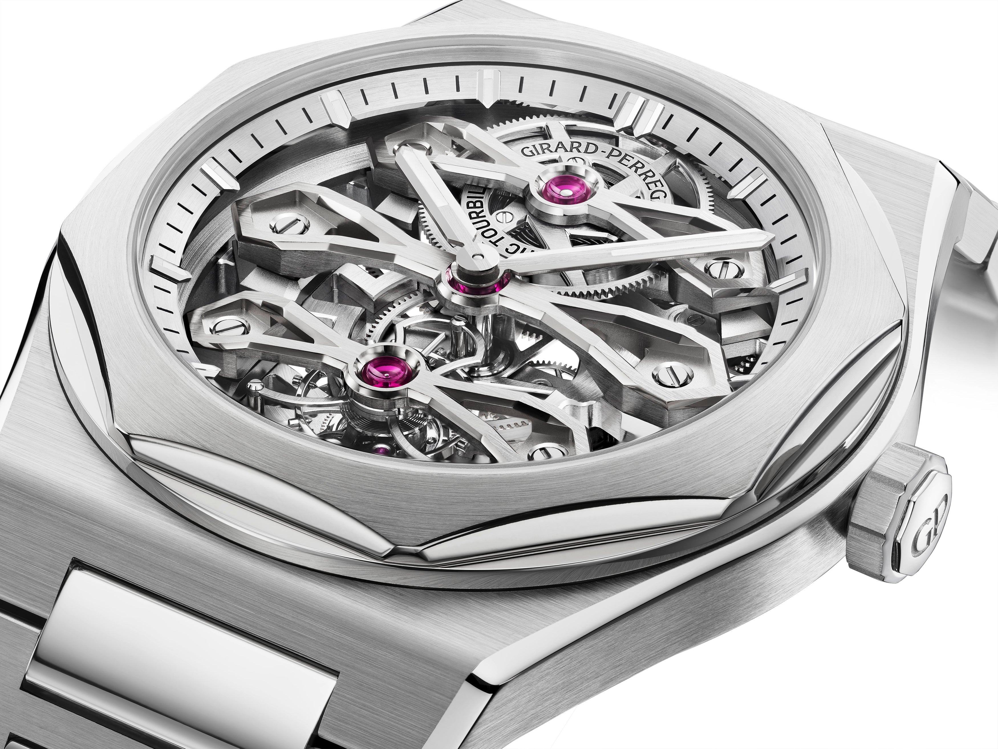 A close-up of the Girard-Perregaux Laureato Three Gold Bridges skeleton watch, highlighting its exposed gears, signature tourbillon movement, and polished stainless steel case with bracelet.