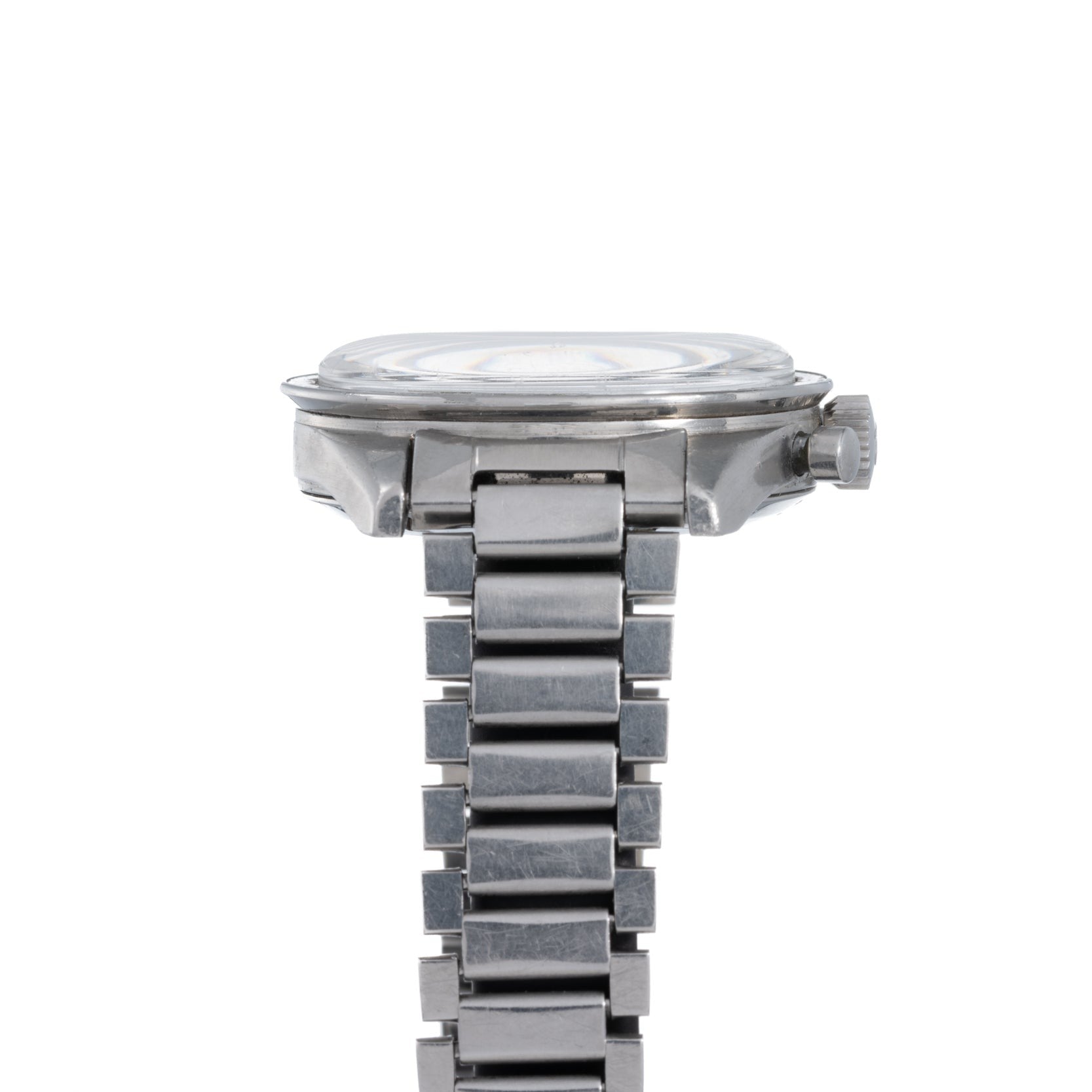 OMEGA Speedmaster wristwatch displayed from the side, with a round face and linked silver metal band.