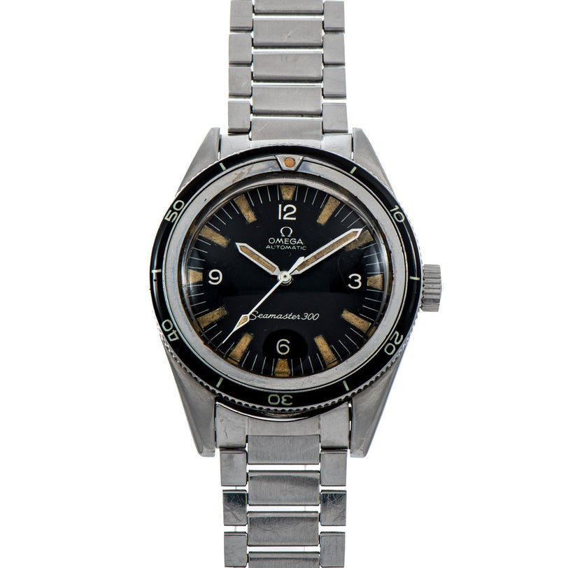 The OMEGA Seamaster 300 is a vintage wristwatch featuring a black dial and silver metal bracelet.