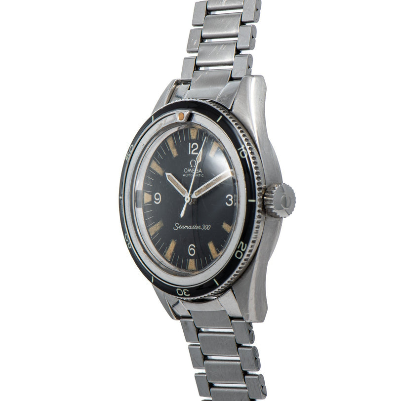OMEGA Seamaster 300 watch featuring a black dial, silver bezel, and metal bracelet, shown from an angled view.