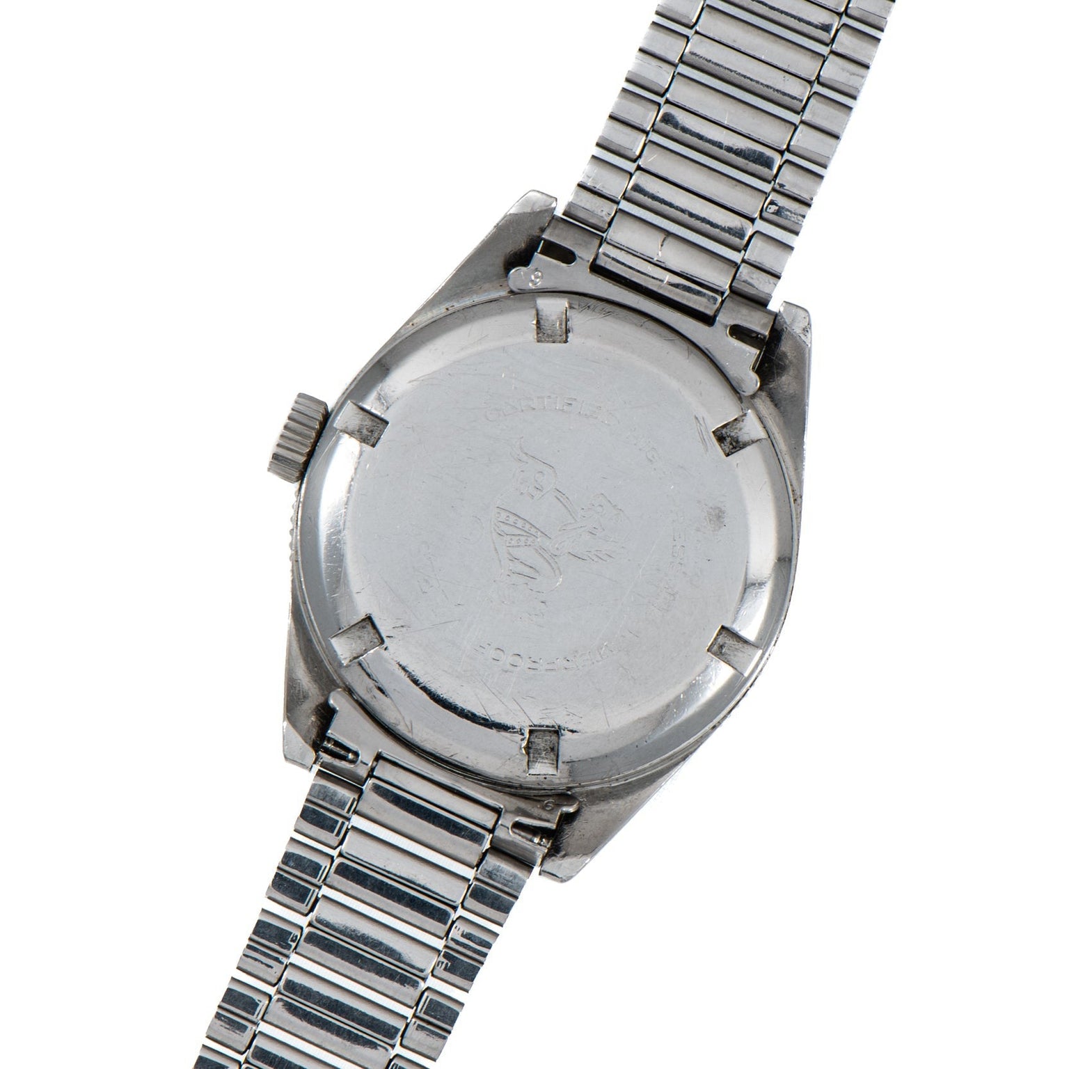 Back of the OMEGA Seamaster 300 silver wristwatch with metal strap, featuring engraved logo and markings on the case.