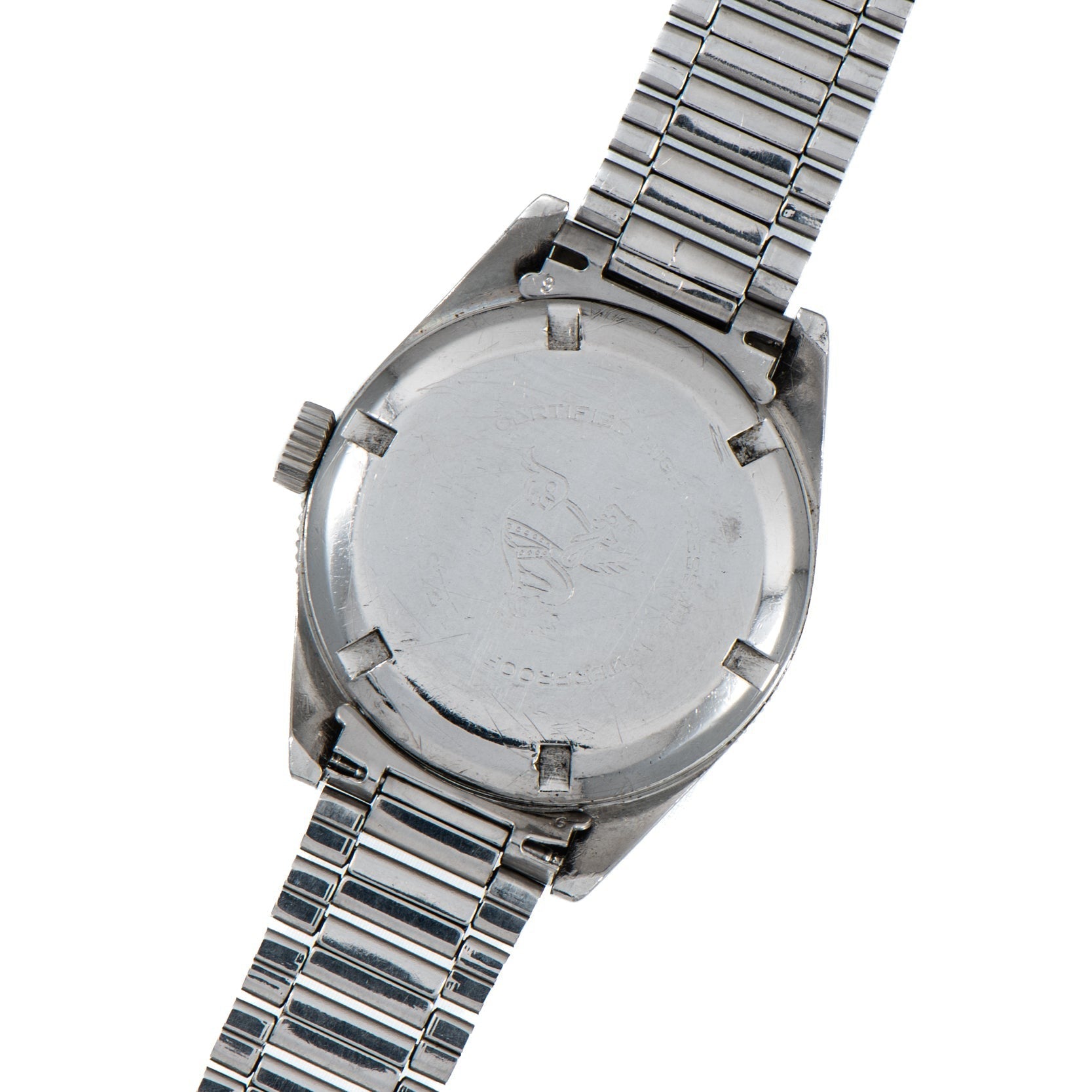 Back of the OMEGA Seamaster 300 silver wristwatch with metal strap, featuring engraved logo and markings on the case.