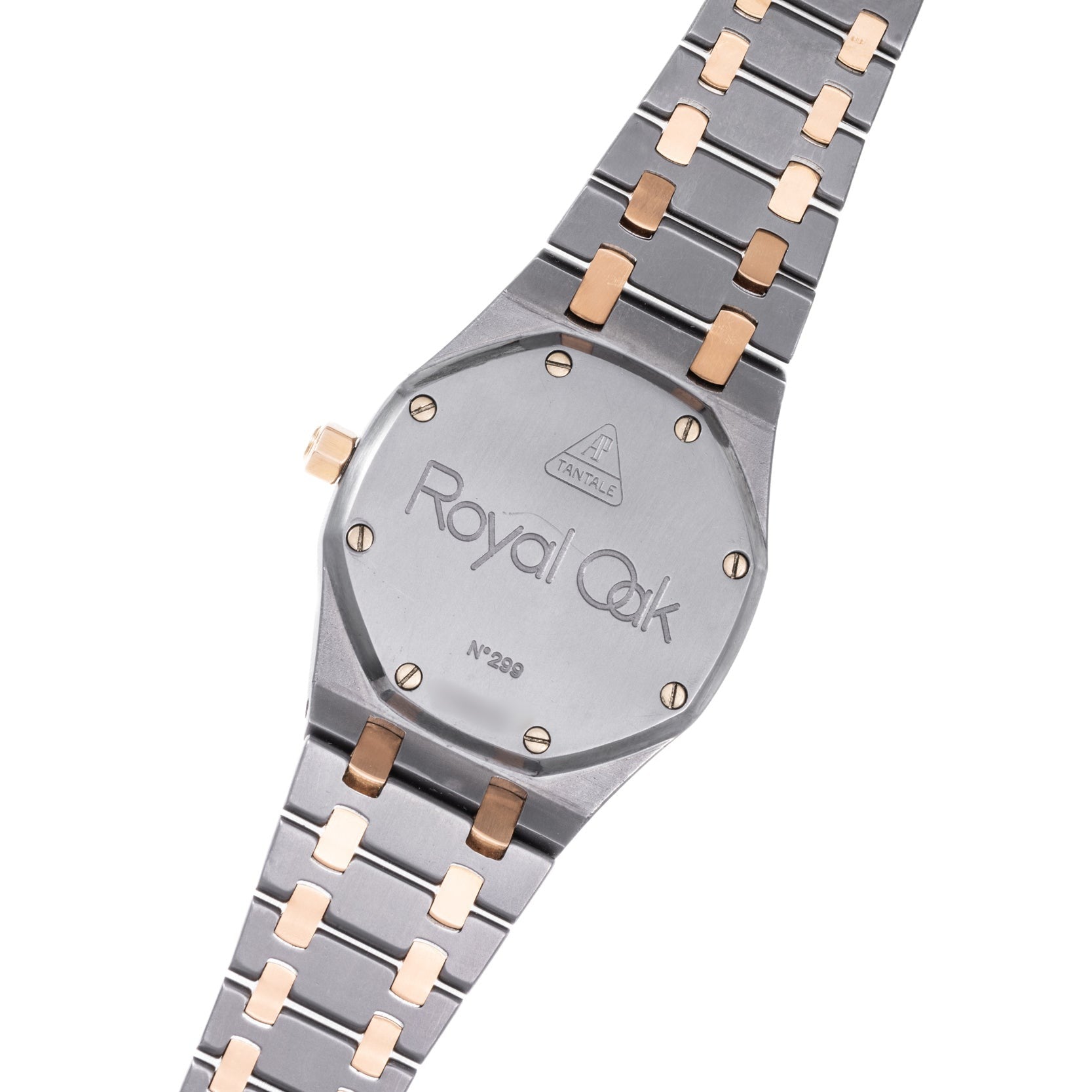 The Audemars Piguet Royal Oak Tantalum wristwatch features a metal band and an engraved case back.