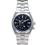 The Vacheron Constantin Overseas Dual-Time features a silver case, black dial, metal bracelet, and angled date display.