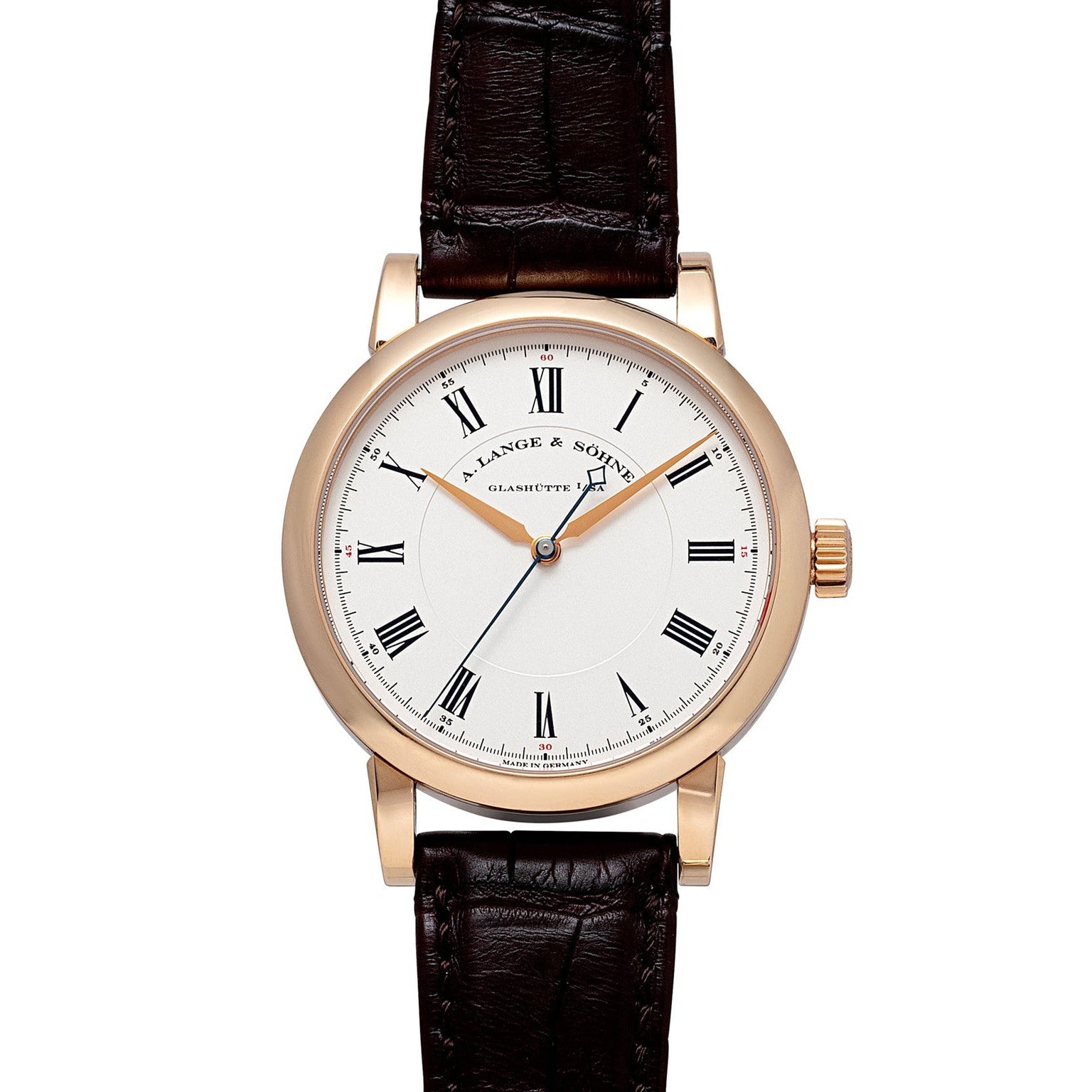 The Richard Lange by Lange & Sohne is a gold wristwatch featuring a white face with Roman numerals and a brown leather strap.