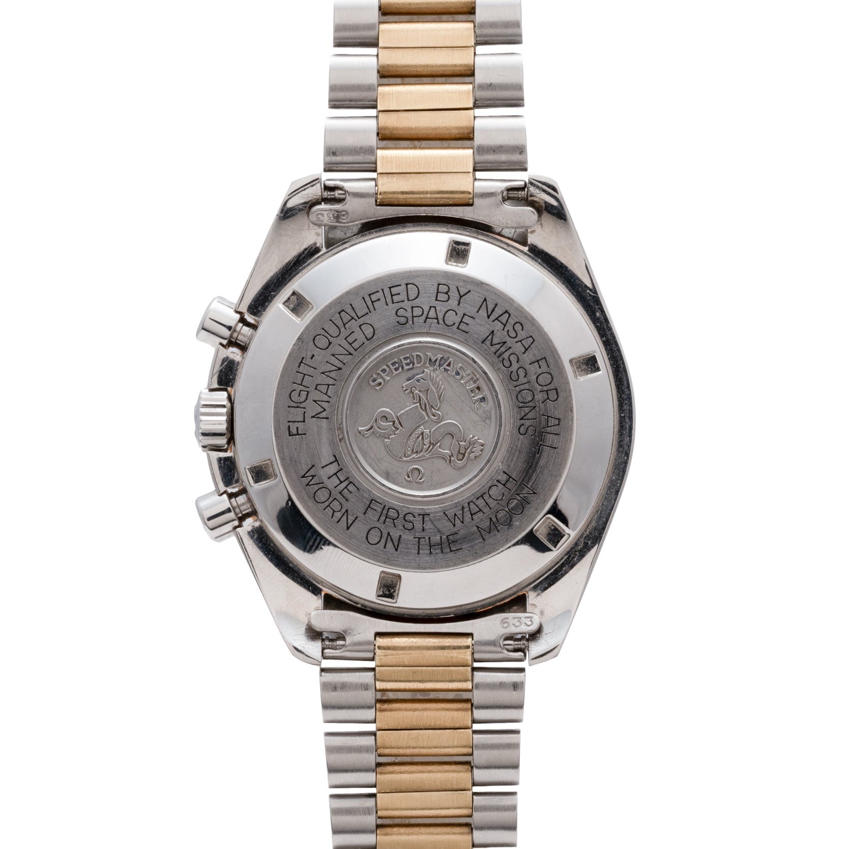Back of the OMEGA Speedmaster Professional Two-Tone watch, engraved with NASA space mission and moon landing details.
