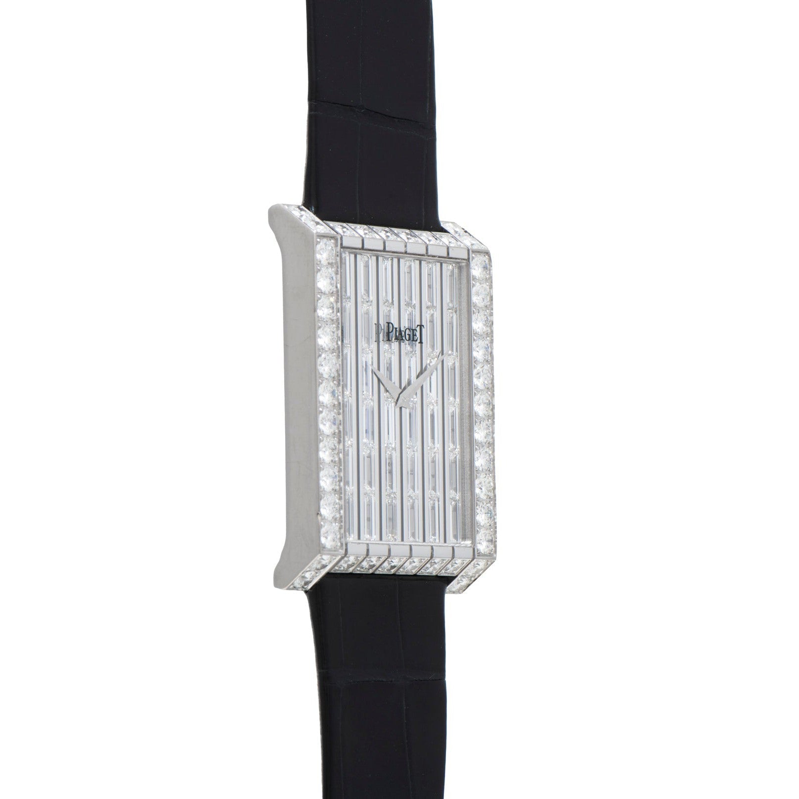 A Piaget Limelight Baguette Diamond Dress Watch with a rectangular case and black leather strap, shown at an angle.