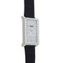 A Piaget Limelight Baguette Diamond Dress Watch with a rectangular case and black leather strap, shown at an angle.