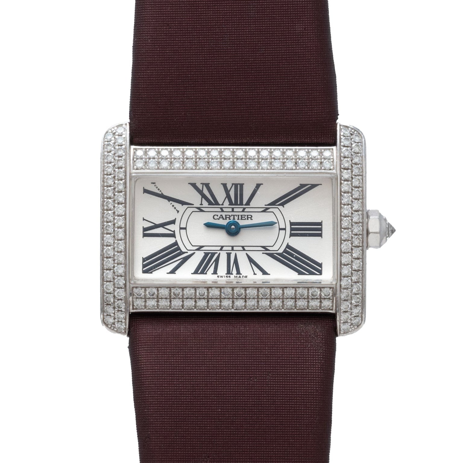 Cartier Tank Divan watch featuring a rectangular case, diamond bezel, Roman numerals, and a burgundy strap.