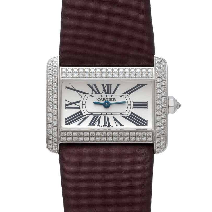 Cartier Tank Divan watch featuring a rectangular case, diamond bezel, Roman numerals, and a burgundy strap.