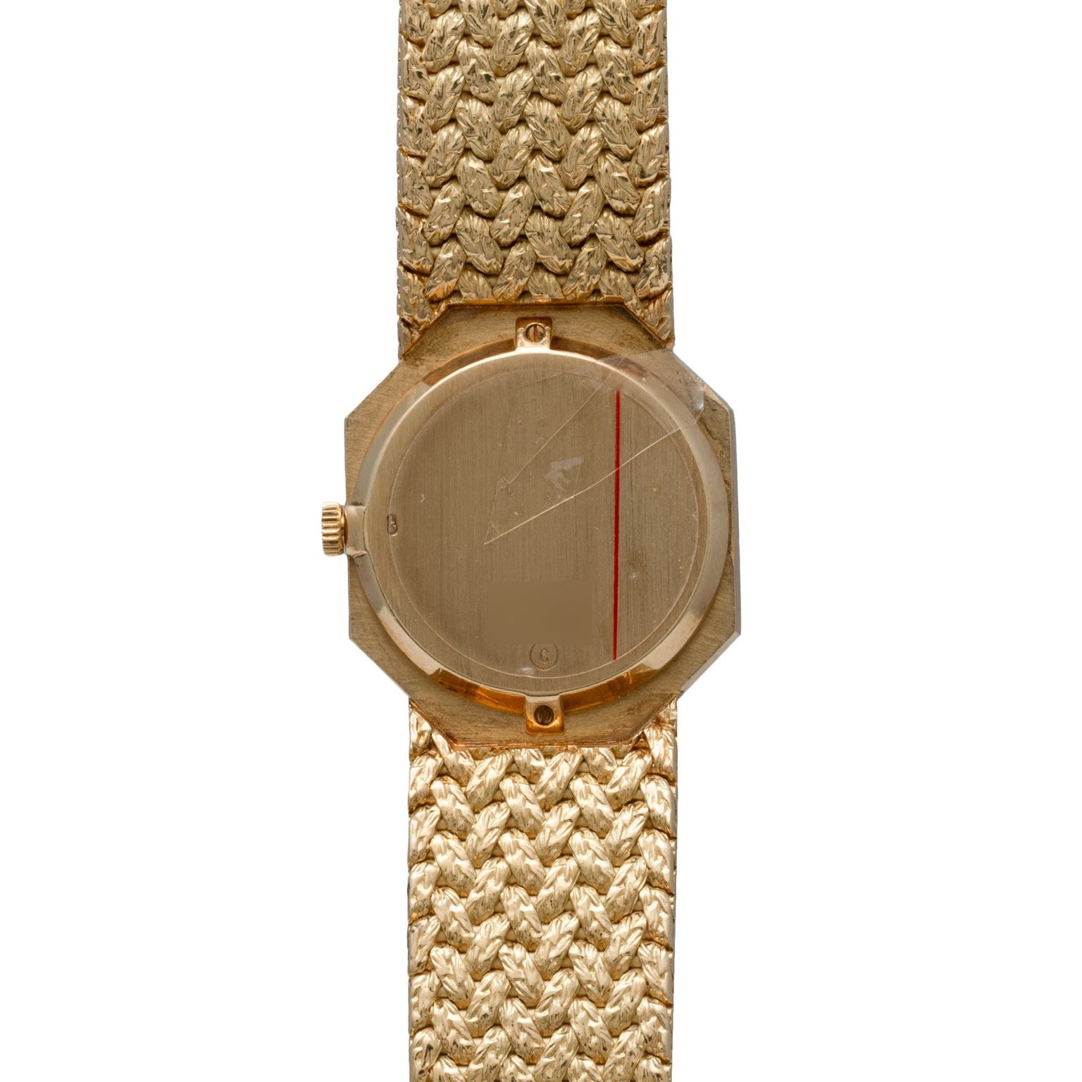 The Piaget Onyx Dial is a gold wristwatch featuring a textured band and a minimalist, unmarked face.
