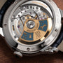 Close-up of the intricate movement and rotor of an Audemars Piguet Millenary Philosophique watch.