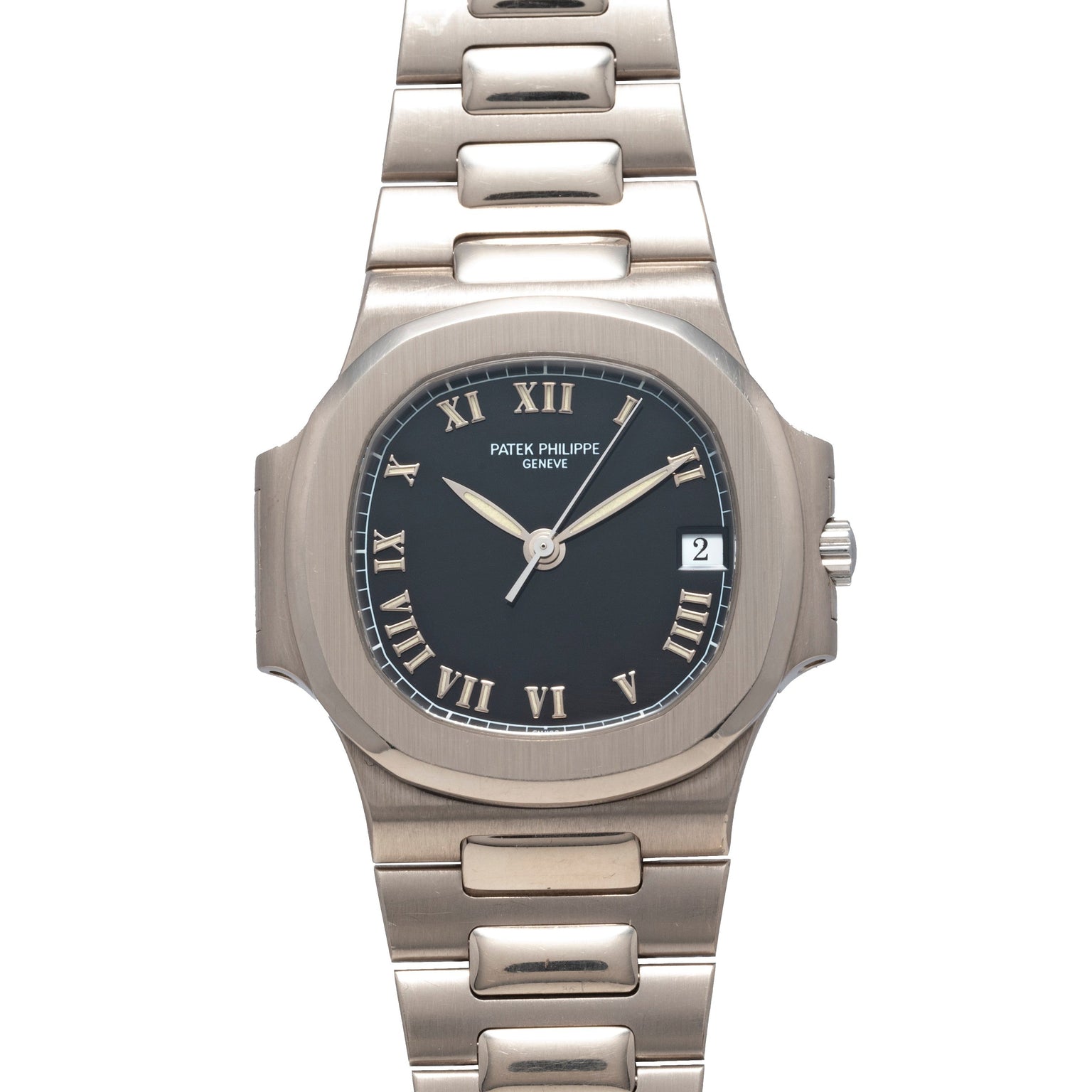 The Patek Philippe Nautilus is a silver wristwatch featuring a black face, Roman numerals, and a date window at 3 oclock.