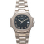 The Patek Philippe Nautilus is a silver wristwatch featuring a black face, Roman numerals, and a date window at 3 oclock.