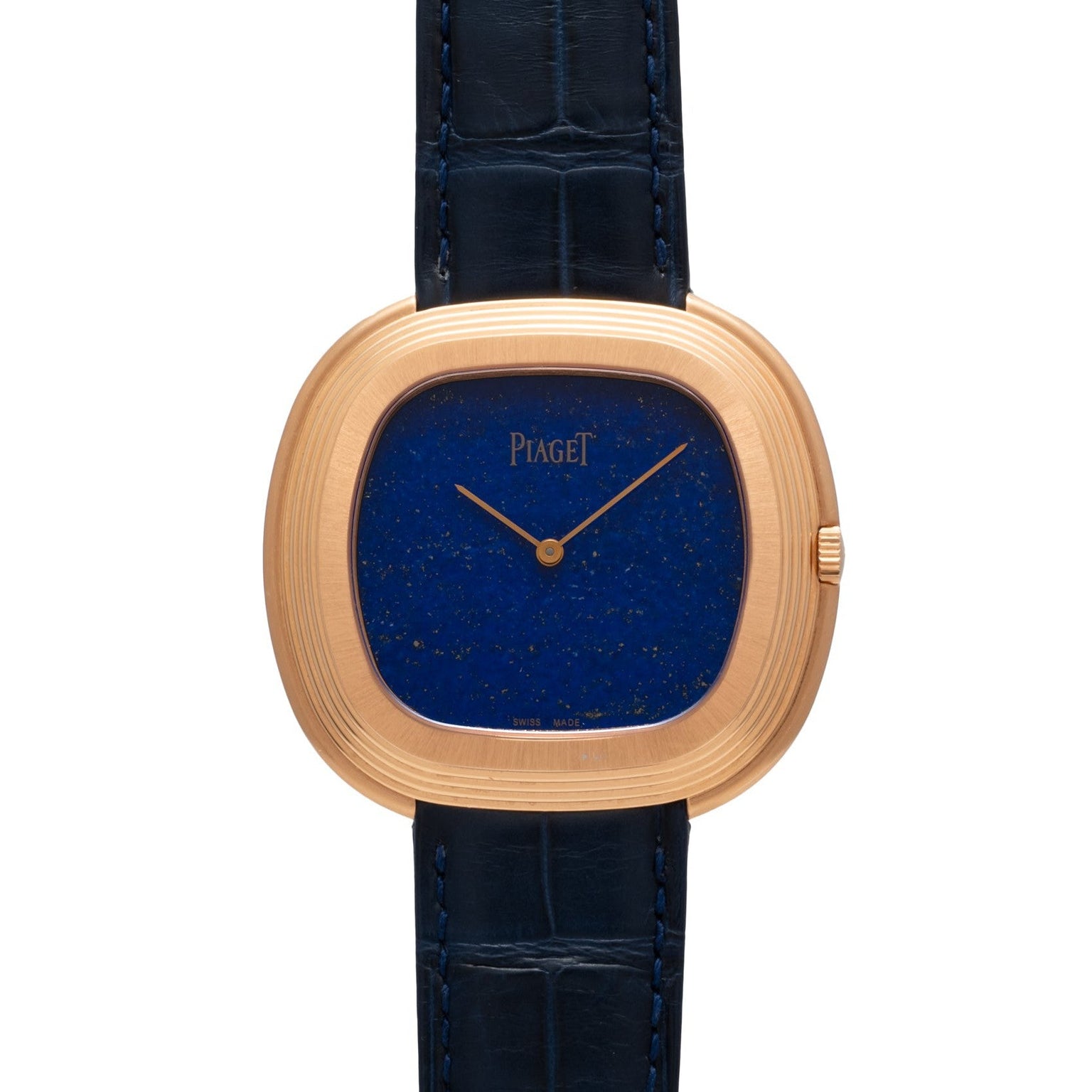 The Piaget Black Tie Andy Warhol watch features a blue lapis lazuli dial, gold case, and black leather strap, shown from the front.