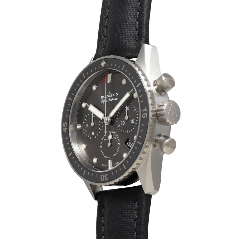 The Blancpain Fifty Fathoms Bathyscaphe Chronographe Flyback is a luxury black and silver wristwatch featuring chronograph dials and a black strap.