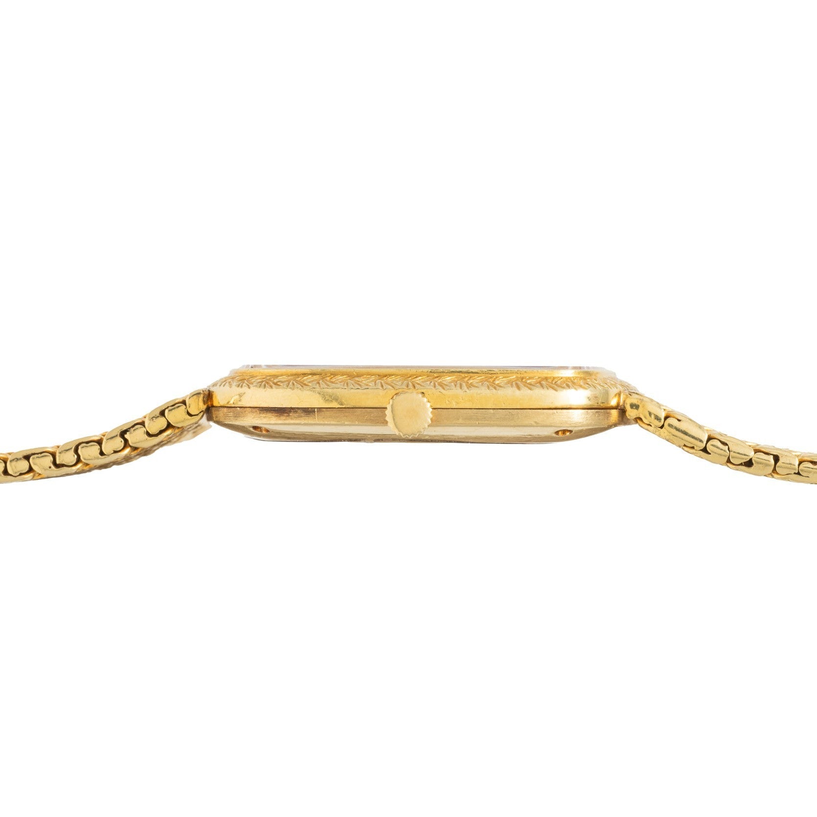 Side view of the Piaget Pave Lapis Lazuli Dress Watch, featuring an engraved gold case and linked band, shown against a white background.