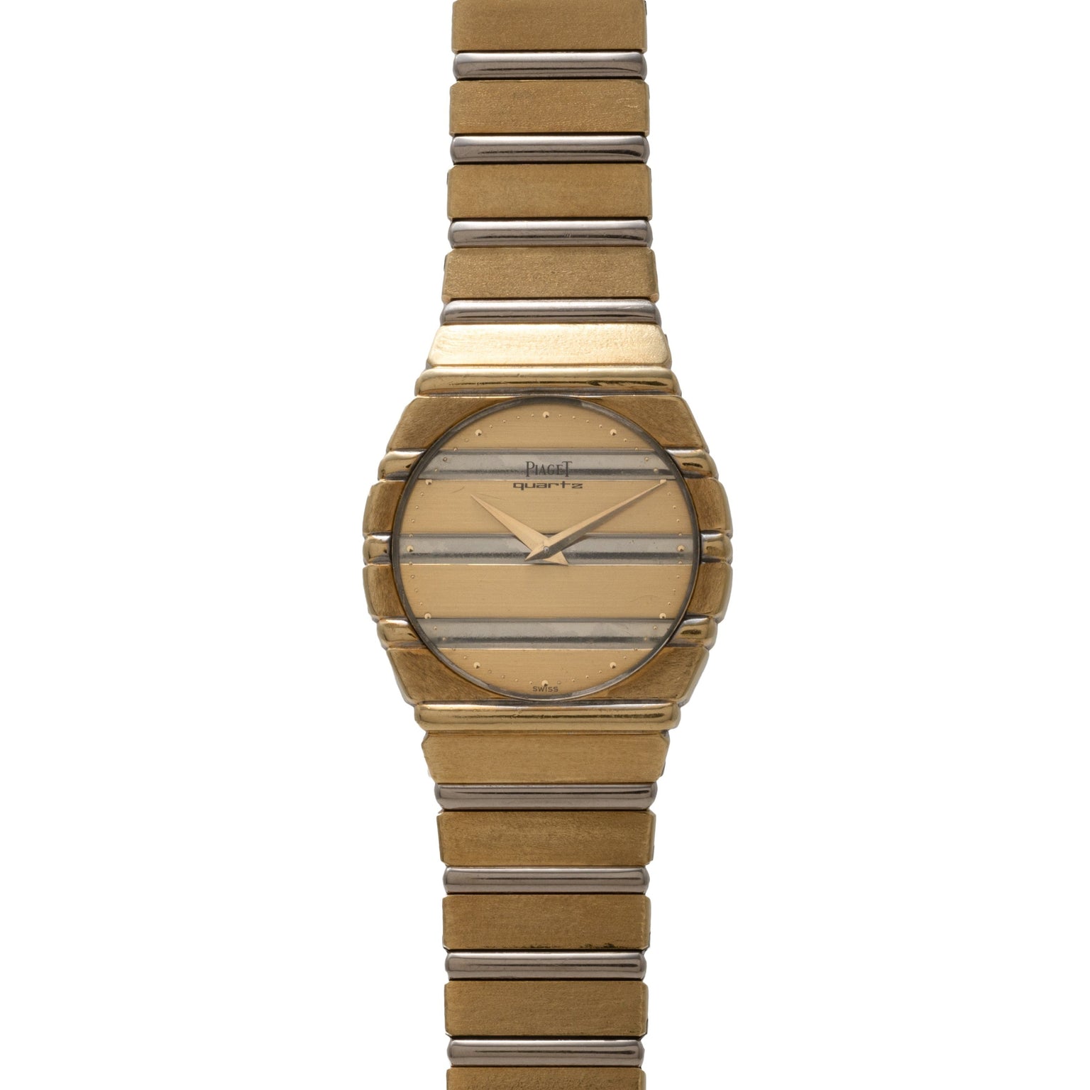 The Piaget Polo Two-Tone features a gold-toned face with horizontal lines and a matching metal link band.
