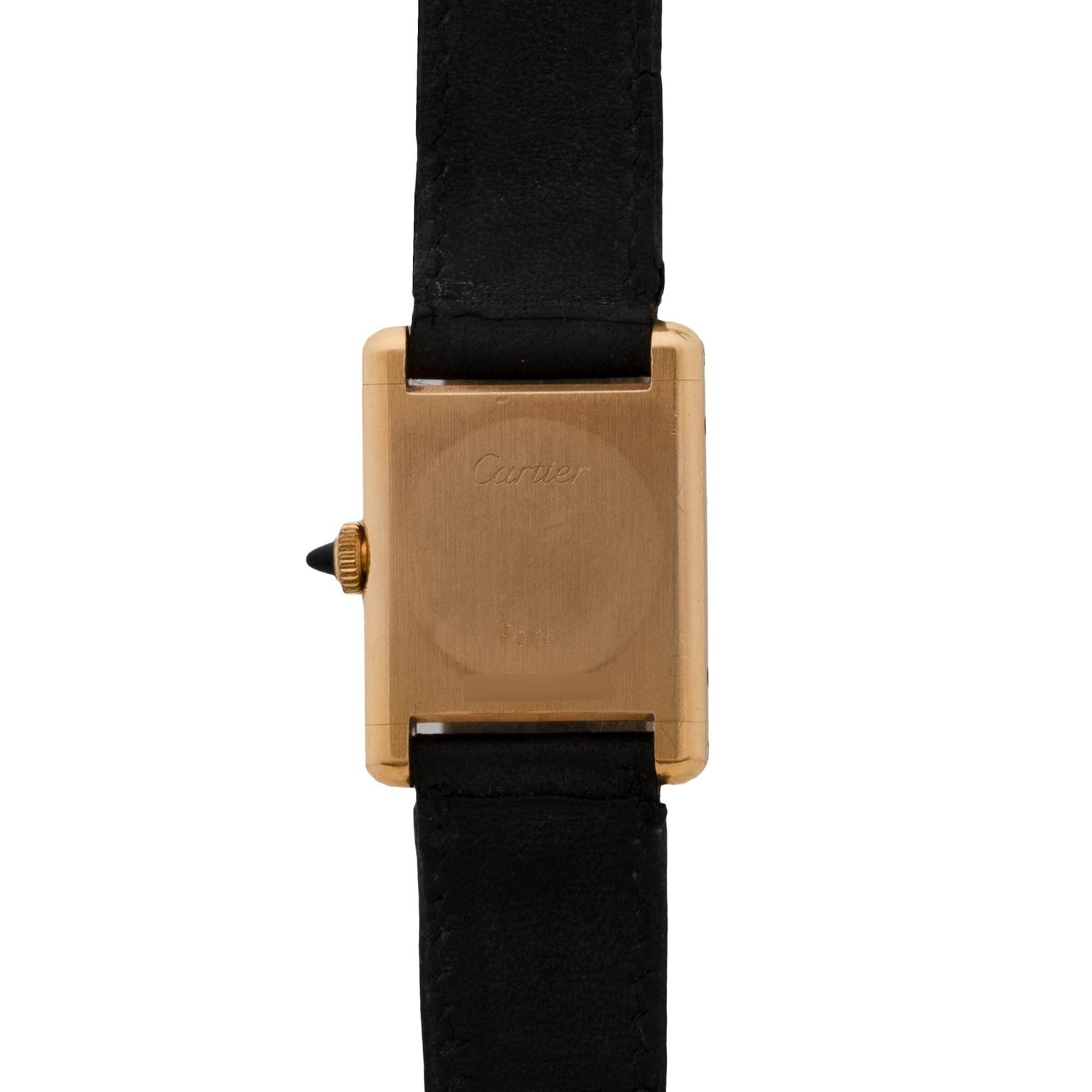 A Cartier Tank Piccolo gold watch case with a black leather strap, shown from the back.