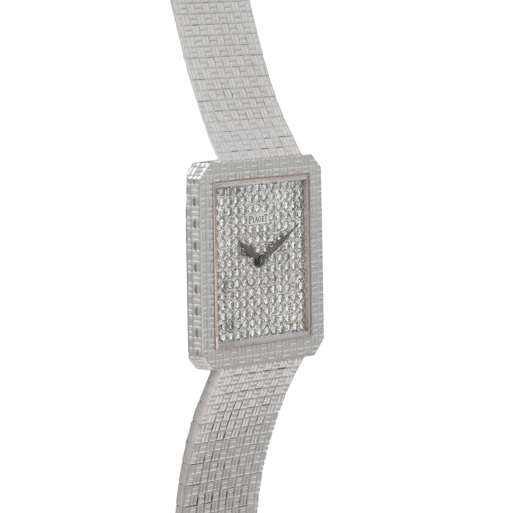 The Piaget Brick Diamond Dress Watch is a luxury silver wristwatch featuring a square diamond-encrusted face and a textured metal band.