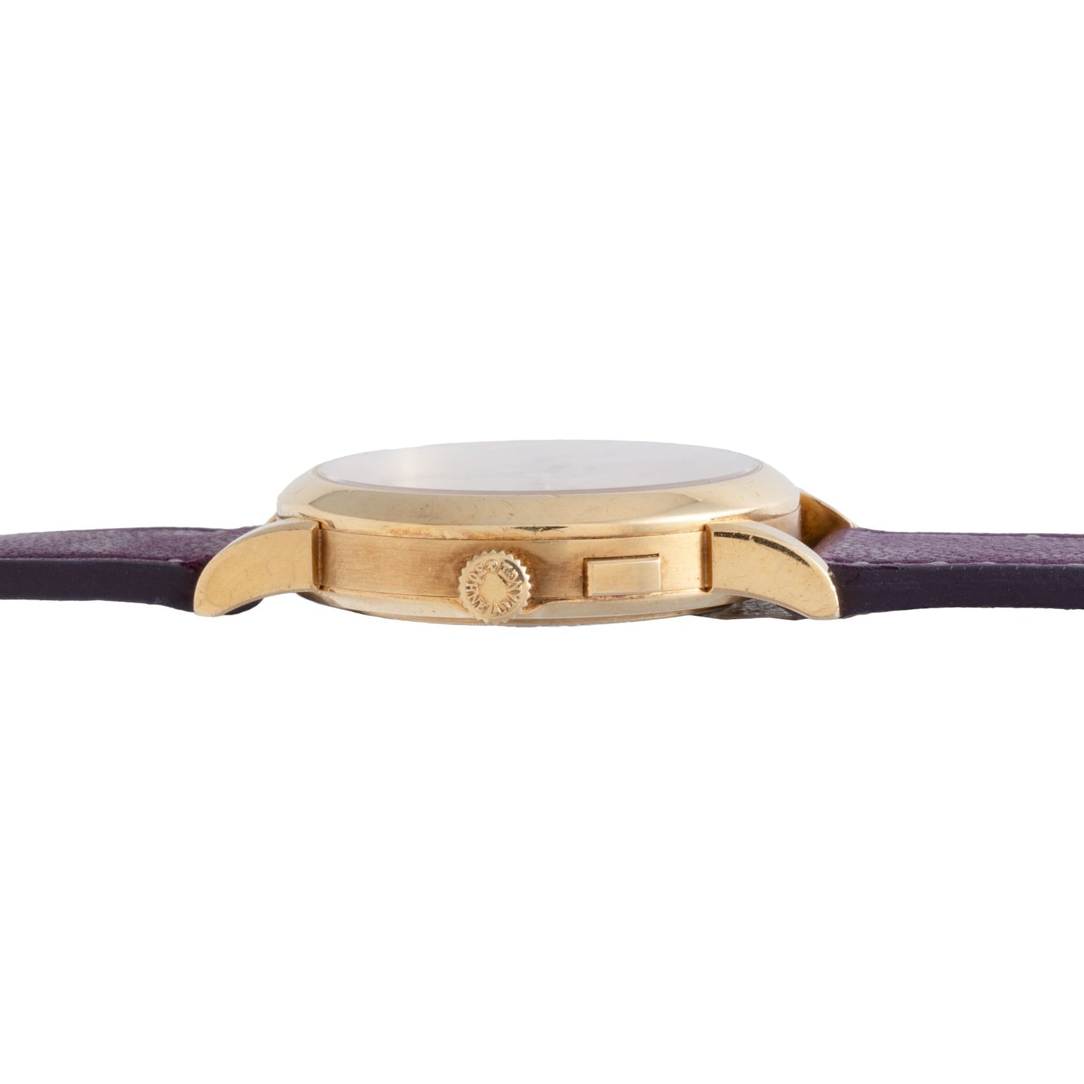 Side view of the Lange & Sohne Saxonia Outsize Date gold case with crown, paired with a purple leather strap.