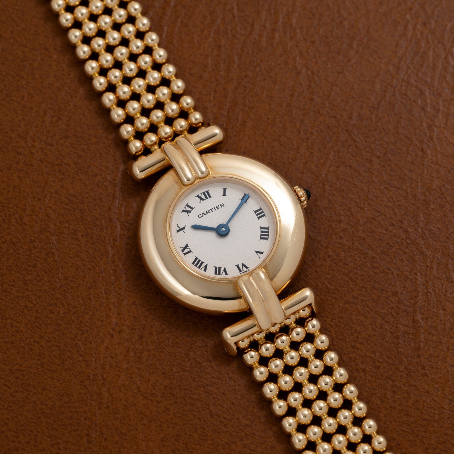 Cartier Ladies Dress Watch featuring Roman numerals on a brown leather strap.