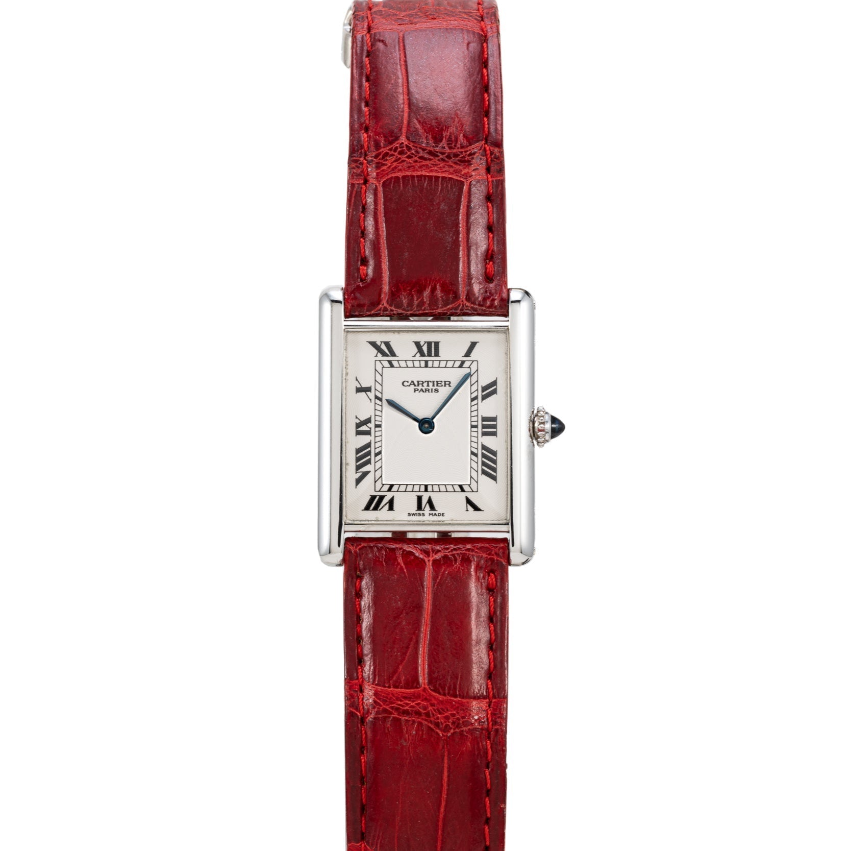 The Cartier Tank Louis watch features a red leather strap and a rectangular face with Roman numerals.