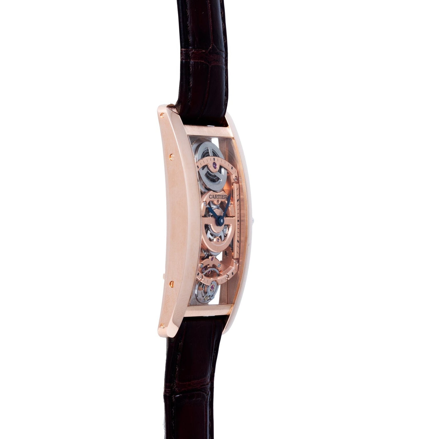 Side view of the Cartier Tank Cintreé Skeleton luxury watch featuring a transparent case, visible gears, and a dark leather strap.