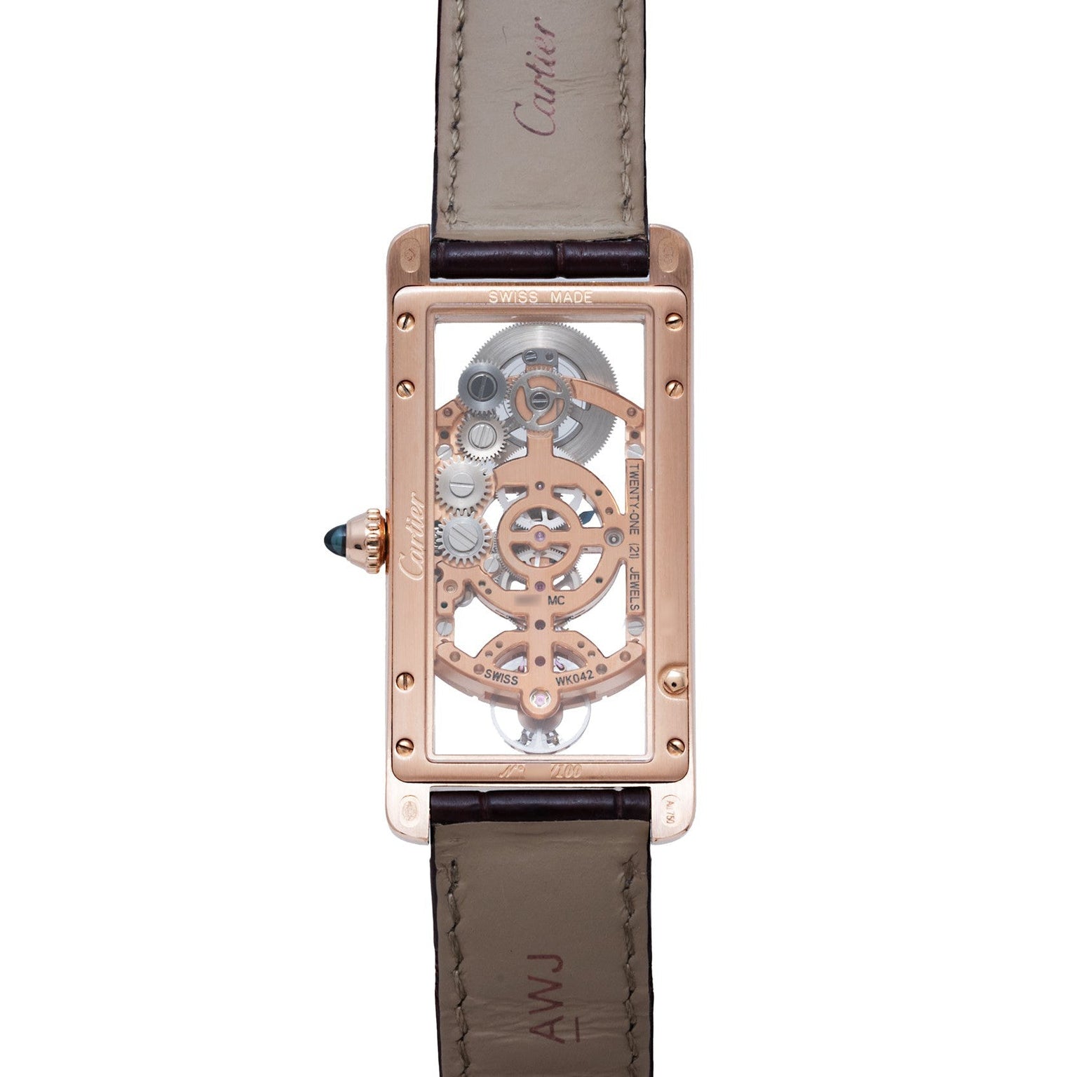 The Cartier Tank Cintreé Skeleton features a rectangular case, visible gears, rose gold finish, and a brown leather strap.
