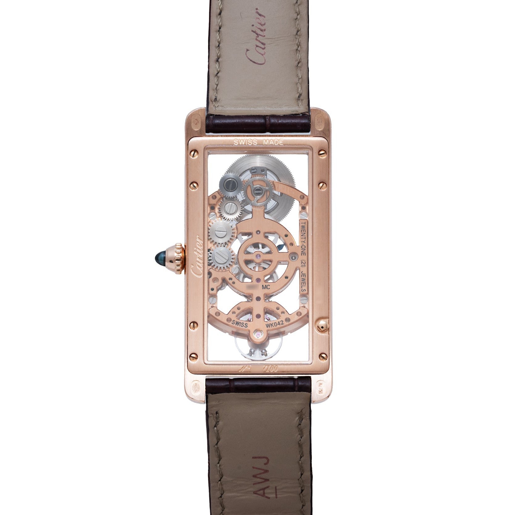 The Cartier Tank Cintreé Skeleton features a rectangular case, visible gears, rose gold finish, and a brown leather strap.