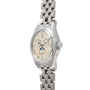 Patek Philippe Annual Calendar wristwatch with metal link band and cream dial, displayed at an angle.