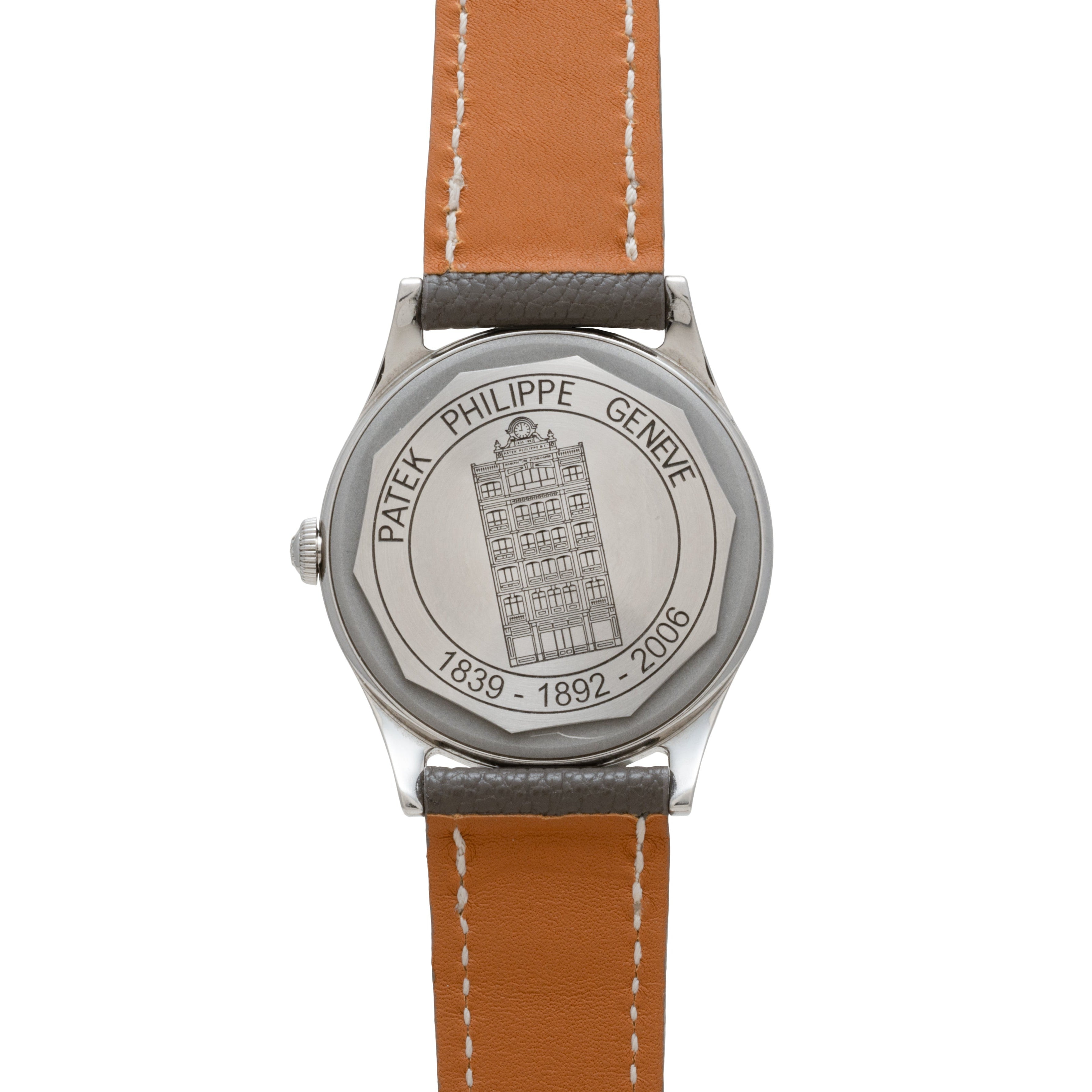 The Calatrava Geneva Boutique Limited Edition by Patek Philippe features a wristwatch back engraved with a building, the dates 1839-1892-2006, and “Patek Philippe Genève.”.