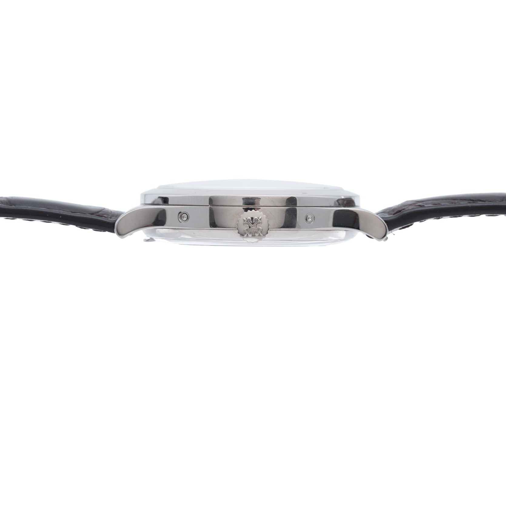 Side view of the Patek Philippe Annual Calendar wristwatch, featuring a round case, crown, and black leather strap against a white background.