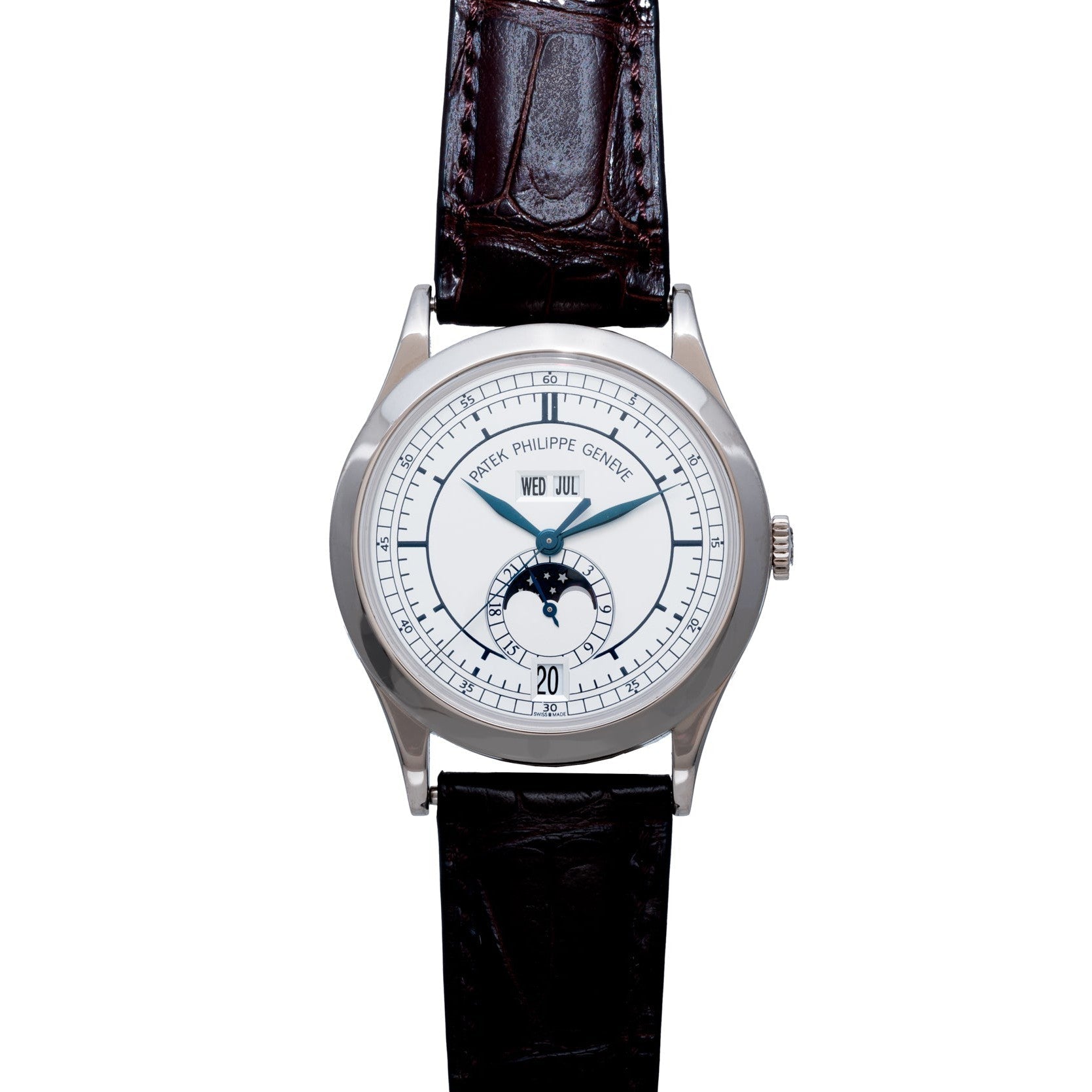 The Patek Philippe Annual Calendar is a luxury wristwatch featuring a white dial, black leather strap, and moon phase display.