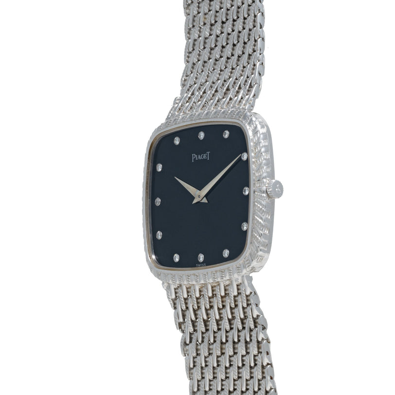 Piaget Onyx Dial White Gold Dress Watch featuring a black rectangular face, diamond hour markers, and a textured white gold band.