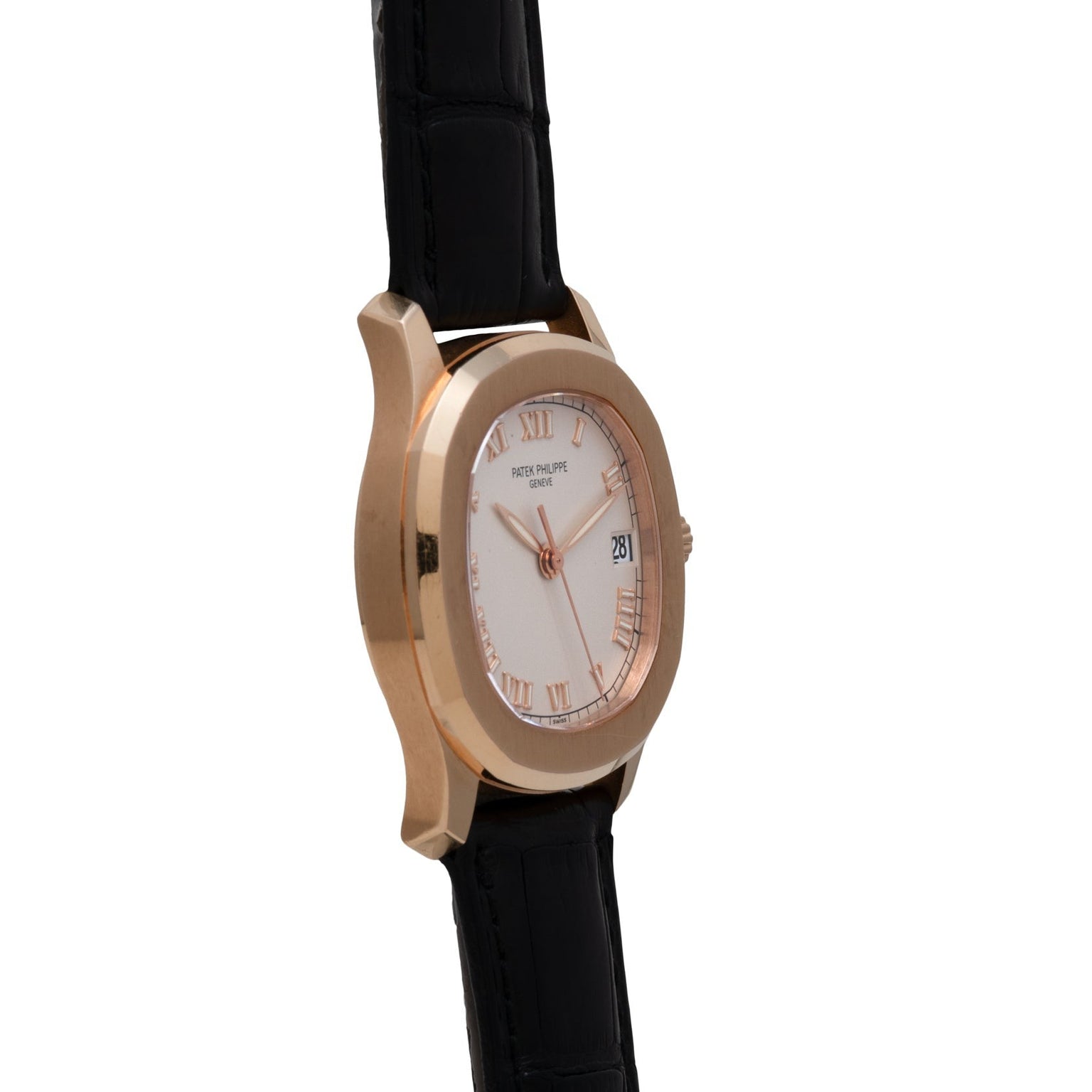 A Patek Philippe Aquanaut gold wristwatch with a white face, Roman numerals, and a black leather strap, viewed from an angle.