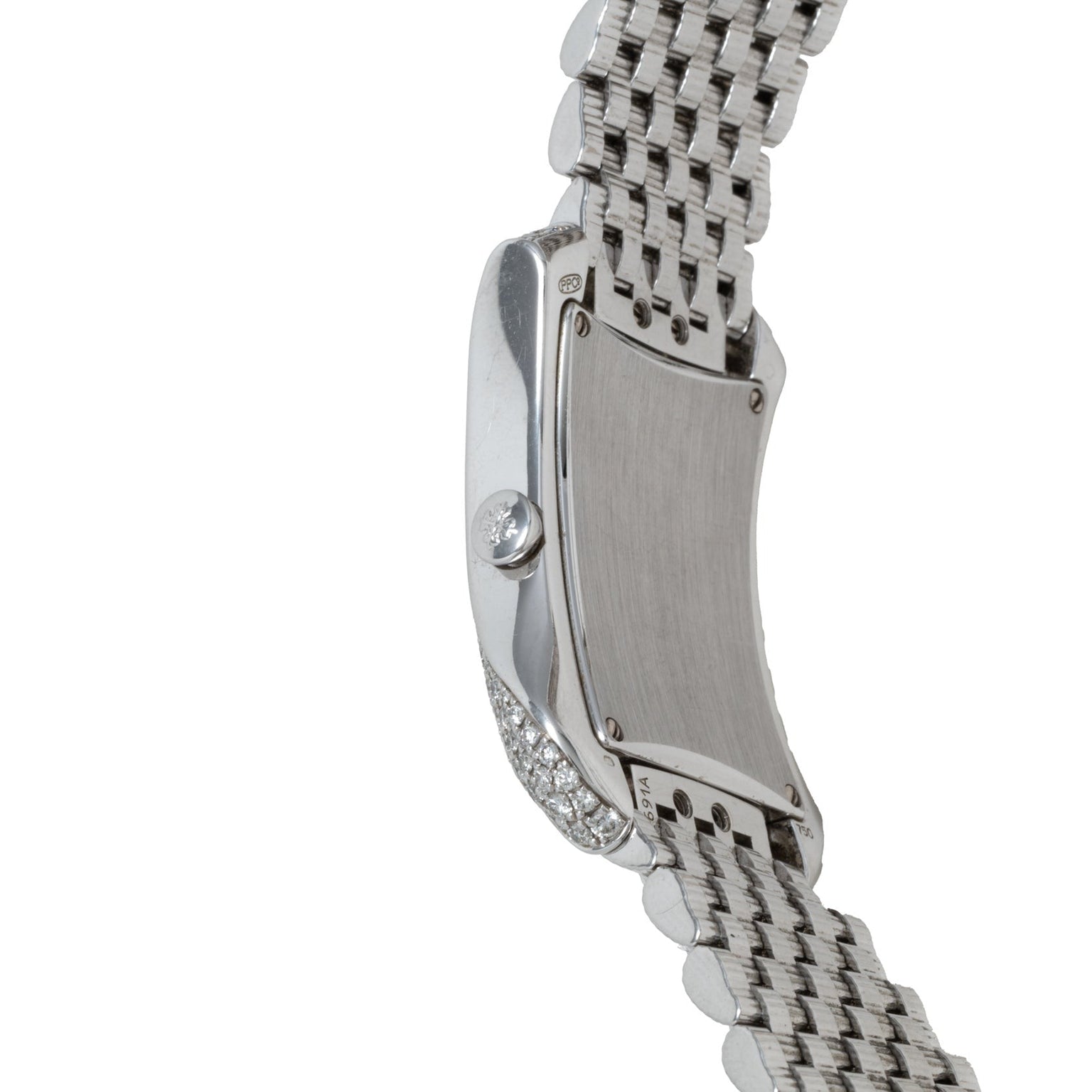 Side view of a Patek Philippe Gondolo Ladies silver wristwatch with a metal link band and a blank, rectangular face.