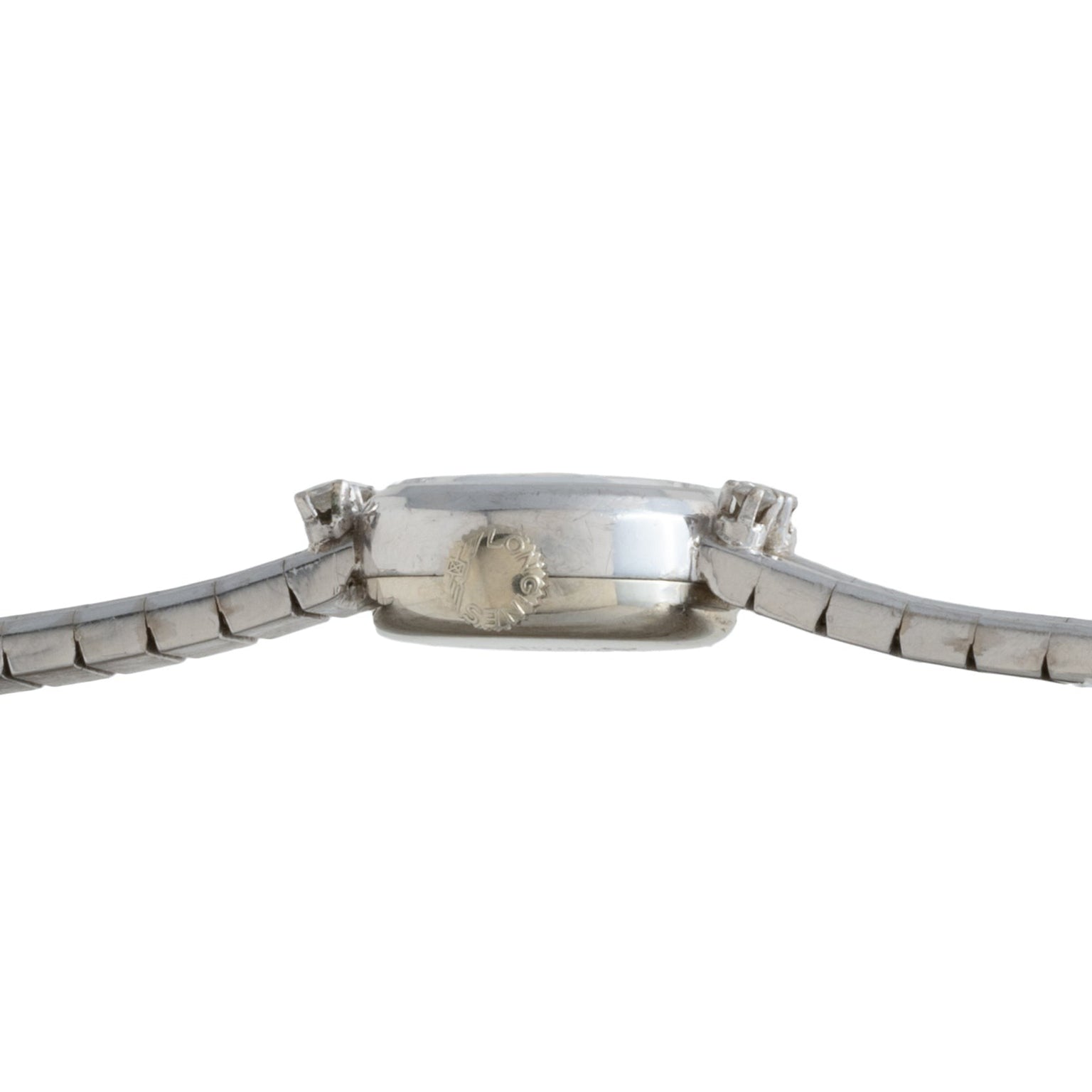 Side view of the Longines Diamond Cocktail Watch showing its silver metal band and a prominent crown on the right side of the case.