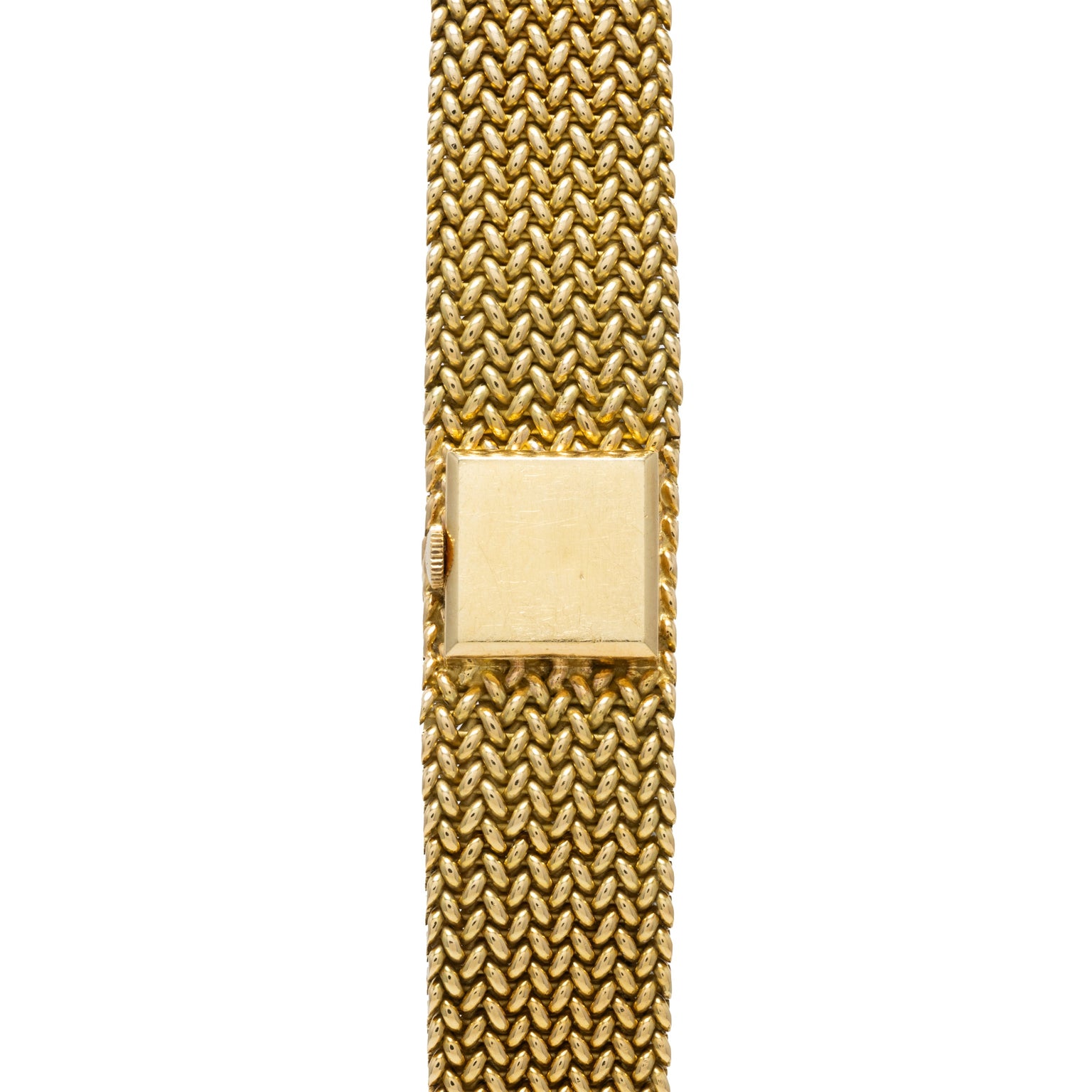 Patek Philippe Yellow Gold Integrated Dress Watch displayed vertically against a white background, showcasing its gold mesh bracelet and square clasp.