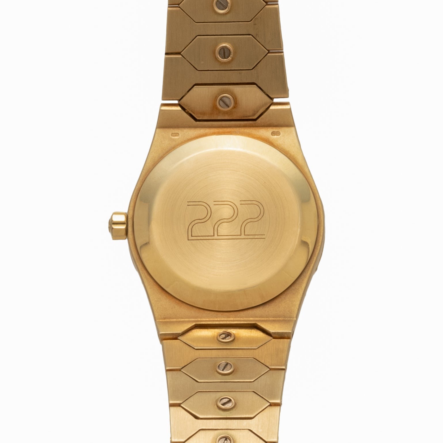 Vacheron Constantin 222 wristwatch by Vacheron Constantin, featuring 222 engraved on the caseback and a metal band, displayed face up on a white background.