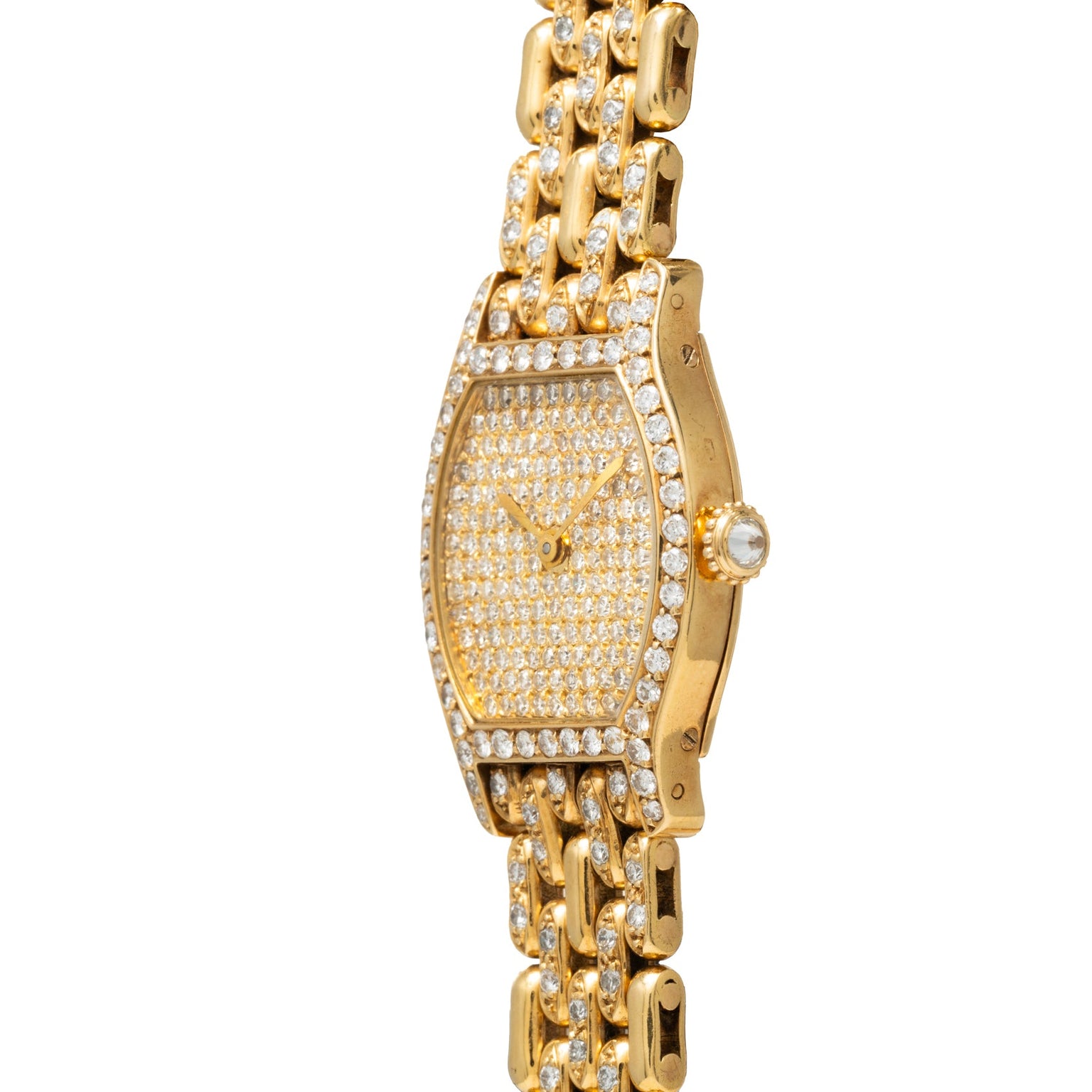 The Cartier Tortue Diamond is a gold wristwatch with a rectangular face, diamond accents, and a matching gold bracelet band.