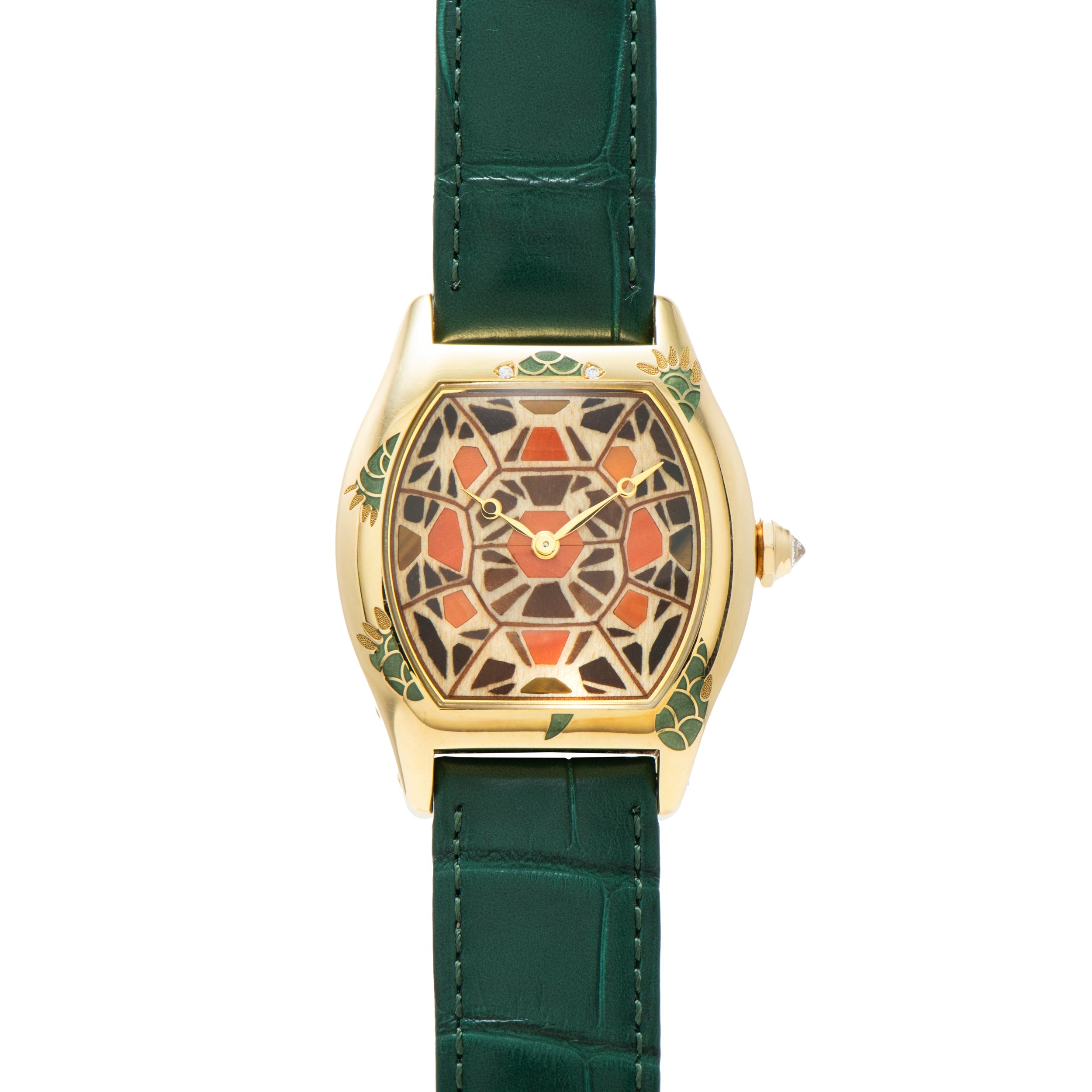 The Cartier Tortue XL Turtle Limited Edition features a gold case, green leather strap, and a geometric mosaic-patterned dial in brown, black, and beige tones.