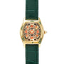 The Cartier Tortue XL Turtle Limited Edition features a gold case, green leather strap, and a geometric mosaic-patterned dial in brown, black, and beige tones.