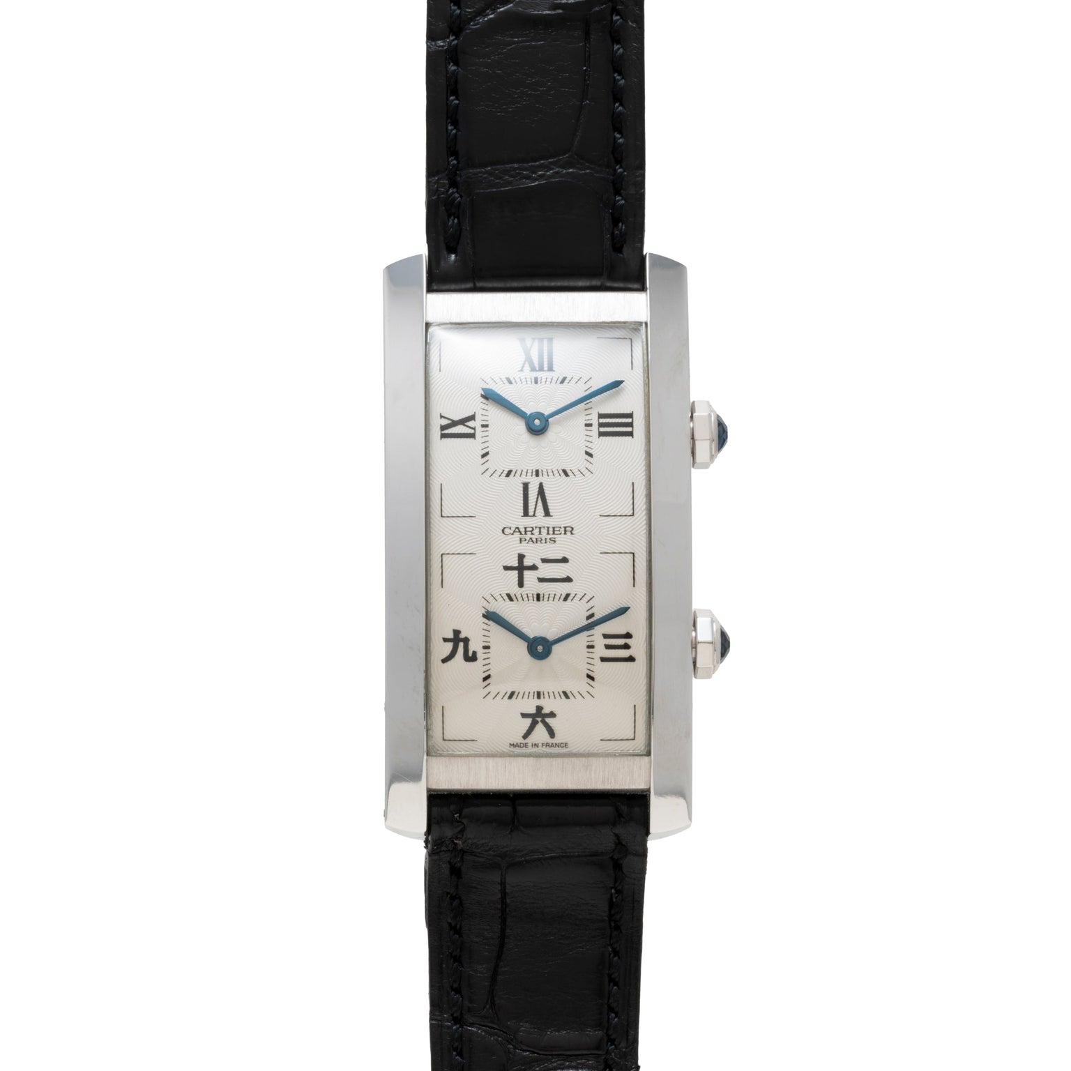 The Cartier Tank Cintrée CPCP Dual-Time features a rectangular case, dual dials, black leather strap, and a white face with Roman and Chinese numerals.