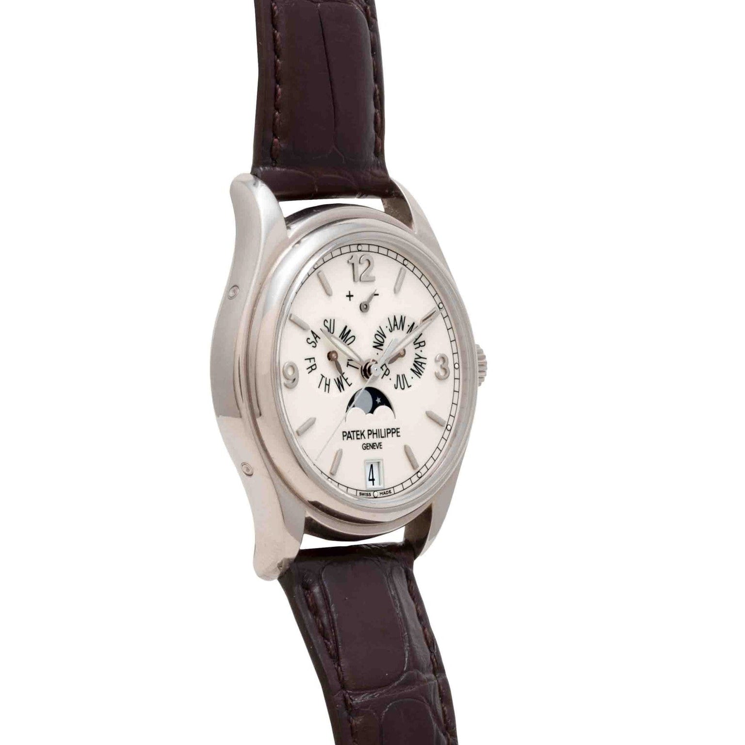 Patek Philippe Annual Calendar Moonphase wristwatch featuring a silver case, white dial, brown leather strap, and multiple subdials.