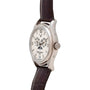 Side view of a silver Patek Philippe Annual Calendar Moonphase wristwatch featuring a leather strap and an intricate calendar dial.