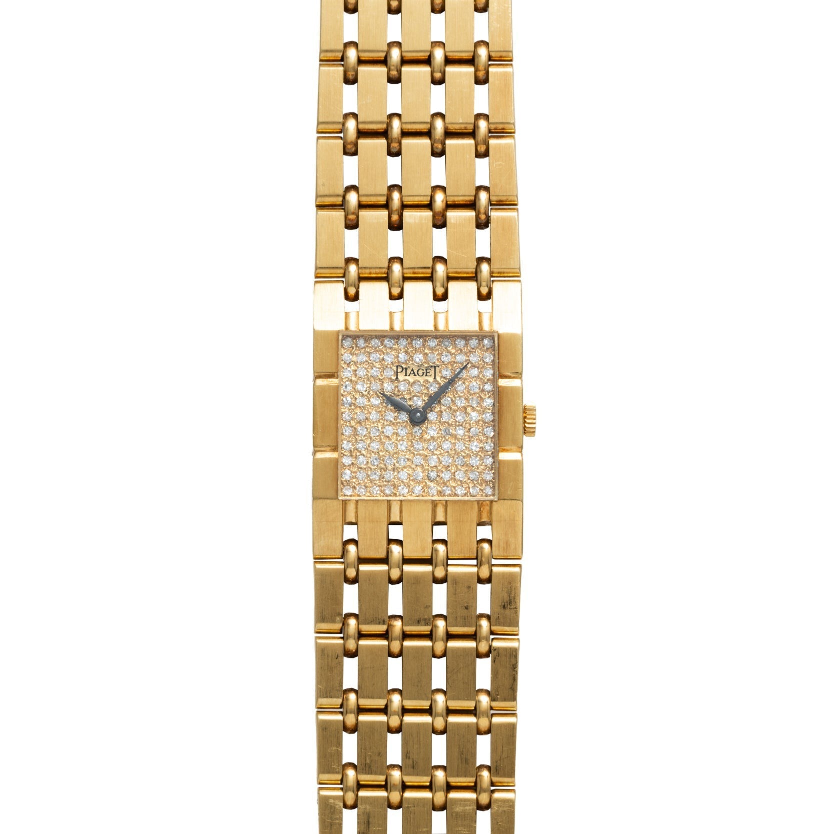 The Piaget Dancer wristwatch features a rectangular, diamond-encrusted face and a linked gold bracelet.